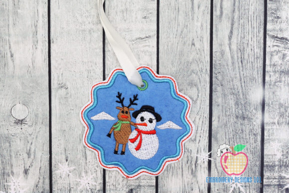 Reindeer with Snowman: A Festive Embroidery Design